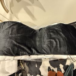 Black massage and heat pad