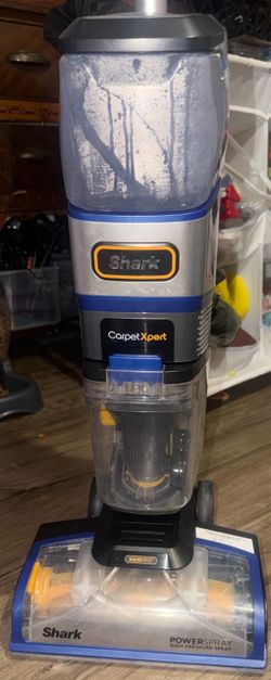 Barely used but left all the accessories in Cali. The upright machine appears to be a Shark CarpetXpert HairPro carpet cleaner, featuring a stacked du