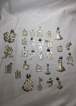 Assortment of Different Sterling Silver Pendant Charms