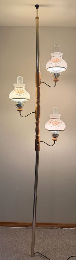 Vintage 3 white floral hurricane brass & wood tension pole lamp. Great condition. Obo.