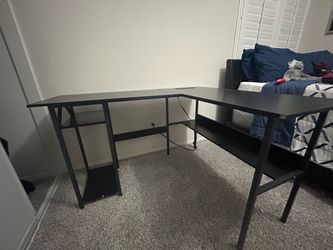 L shaped desk with built in power plug