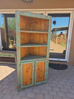 Rustic southwest style corner cabinet