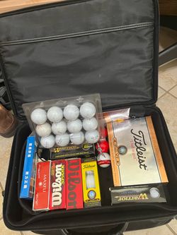 50 new golf balls in original  packaging