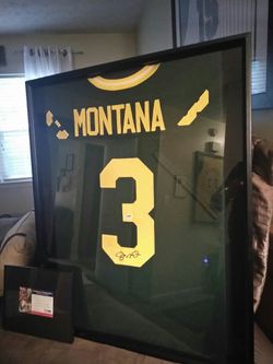 Joe Montana signed authentic framed Jersey with PSA DNA certificate of authenticity
