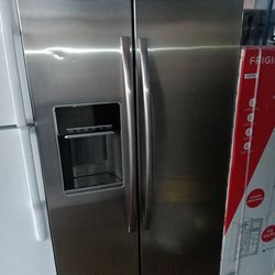 New Frigidaire stainless steel side by side refrigerator