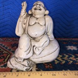a porcelain sculpture of deity (6.7"H), maker's signature/ mark 