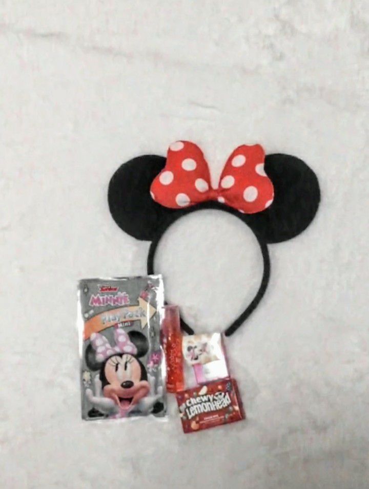 Minnie Mouse ears, red or pink your can choose and add glitter if you'd like. Free gifts with purchase.