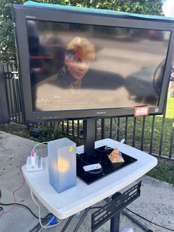32 “ TV WITH 2 table Stands!