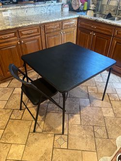 Folding table and one chair