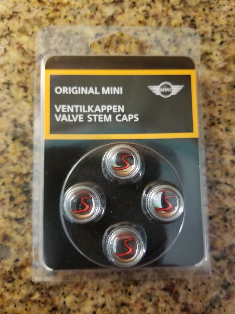 Mini Cooper "S" valve stem caps. Brand new and OEM.