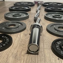 Brand NEW Olympic Curl Bar &  Weight Plates.  Total: 175 lbs