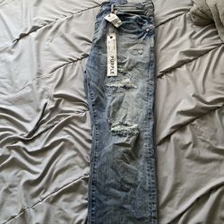 Authentic never worn purple jeans blue size 38