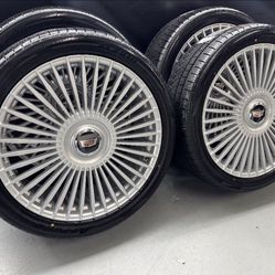 NEW 24 inch silver wheels with cadillac floating caps with atturo 285/40r24 tires. 6 lug gm or ford bolt pattern