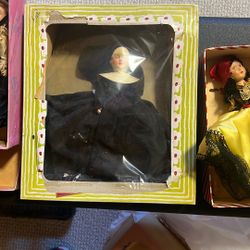 various antique dolls