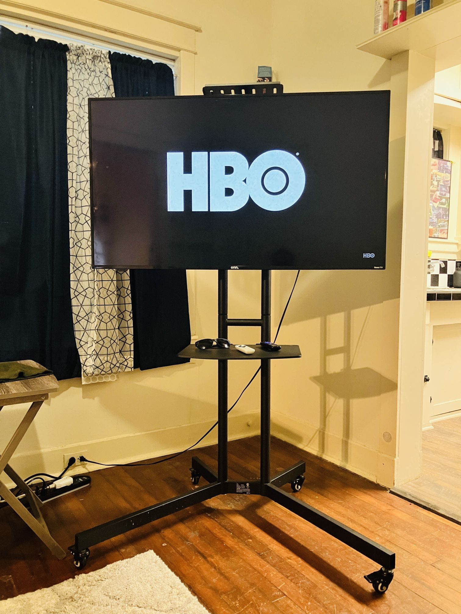 Onn 4K 50 In. Roku Smart TV + Onn Rolling Floor TV Stand