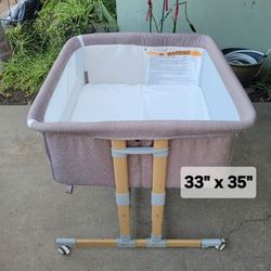Baby bassinet. Bedside sleeping bed for infants.