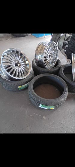 Set of 4 20 inch rims 1 is bent with all 4 center caps
