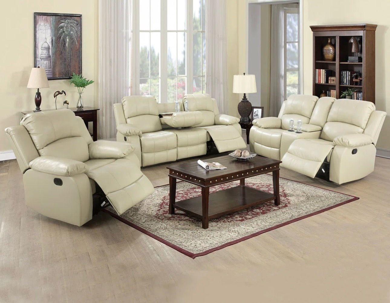 Beige leather fully reclining three piece couch set
