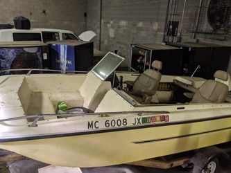 Garage stored FISHING BOAT.