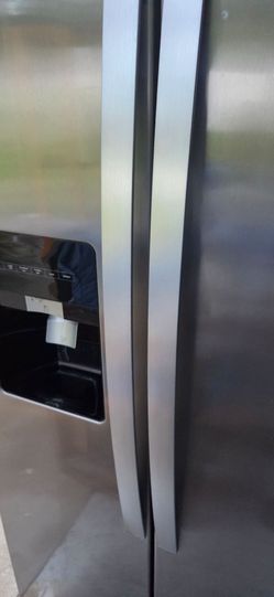 Whirlpool side by side stainless fridge