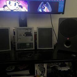 Brookstone Wafer Thin Compact CD Player 