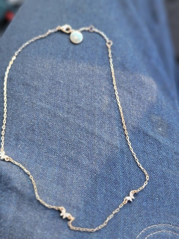 Womans Gold Chain With Diamond Butterfly Pendants