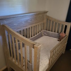 Grey Crib and bed