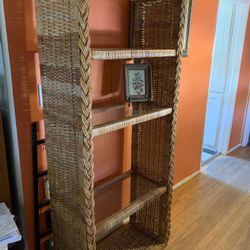 vintage wicker etagere features glass shelves