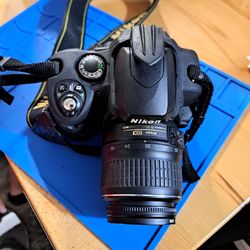Nikon DSLR Camera with 18–55mm Zoom Lens