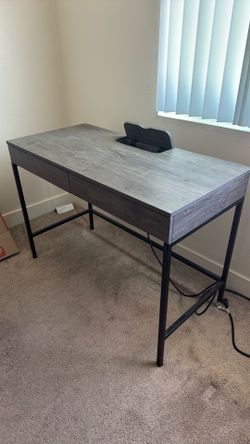 Desk with power outlet
