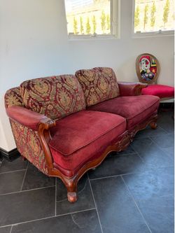 Antique leather Red loveseat