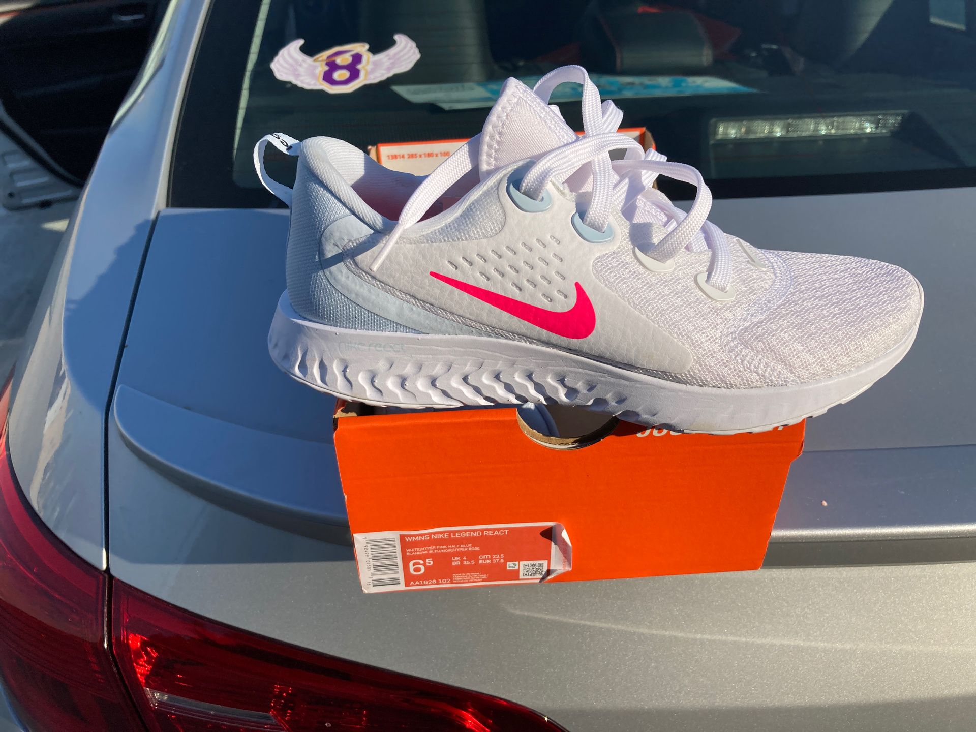 Nike women's legend react women running shoe white pink