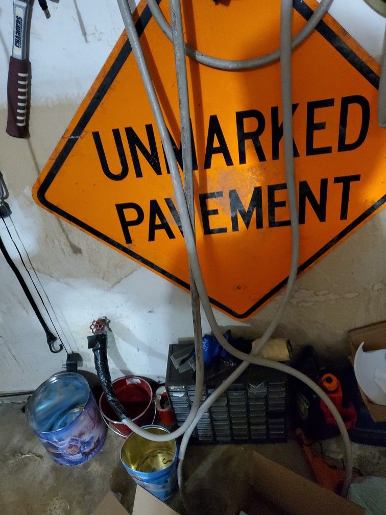 Pavement Sign