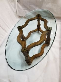 Large glass top oval coffee table