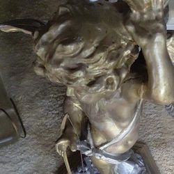 Angel With Arrow Statue