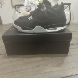 black canvas jordan 4