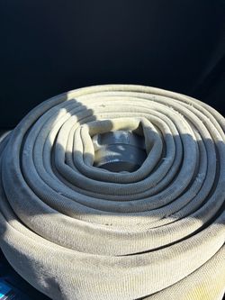 2 fire hoses, 50 ft, 4 inch.