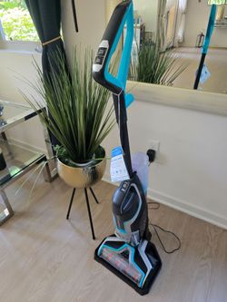 Bissell vacuum and mop in one.
