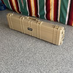 Gun rifle shotgun case.  Plastic with wheels