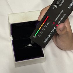 10-carat white gold ring with diamonds, brand new, regular price is $785, I'm only asking for $350, firm price.