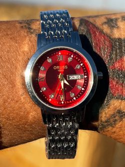 Woman’s red face watch