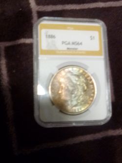 1886 PGA Ms 64 silver Morgan Dollar