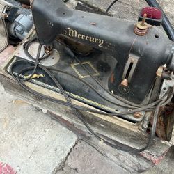 Vintage Mercury sow machine 