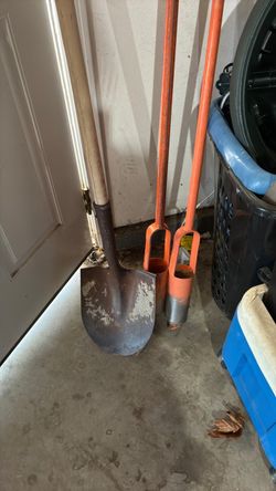Shovel and two Augers and cone and a roll of metal mesh lining