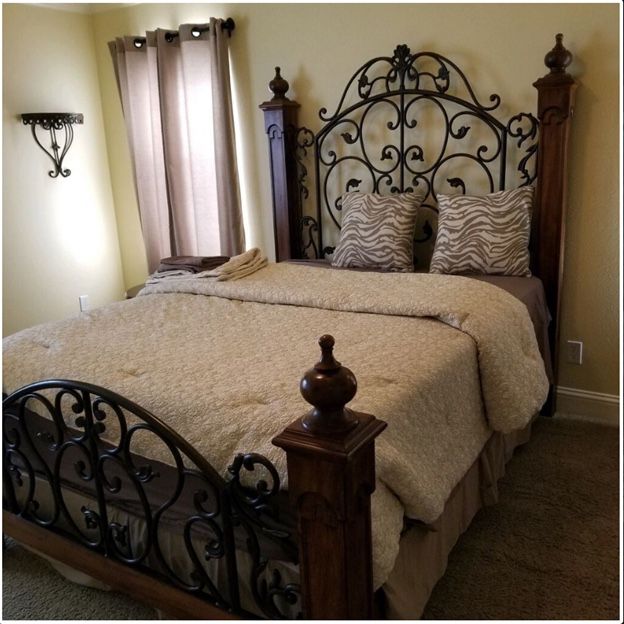 Queen Wrought Iron Bed and one Nightstand