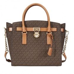 Michael Kors three-piece purse/satchel set.