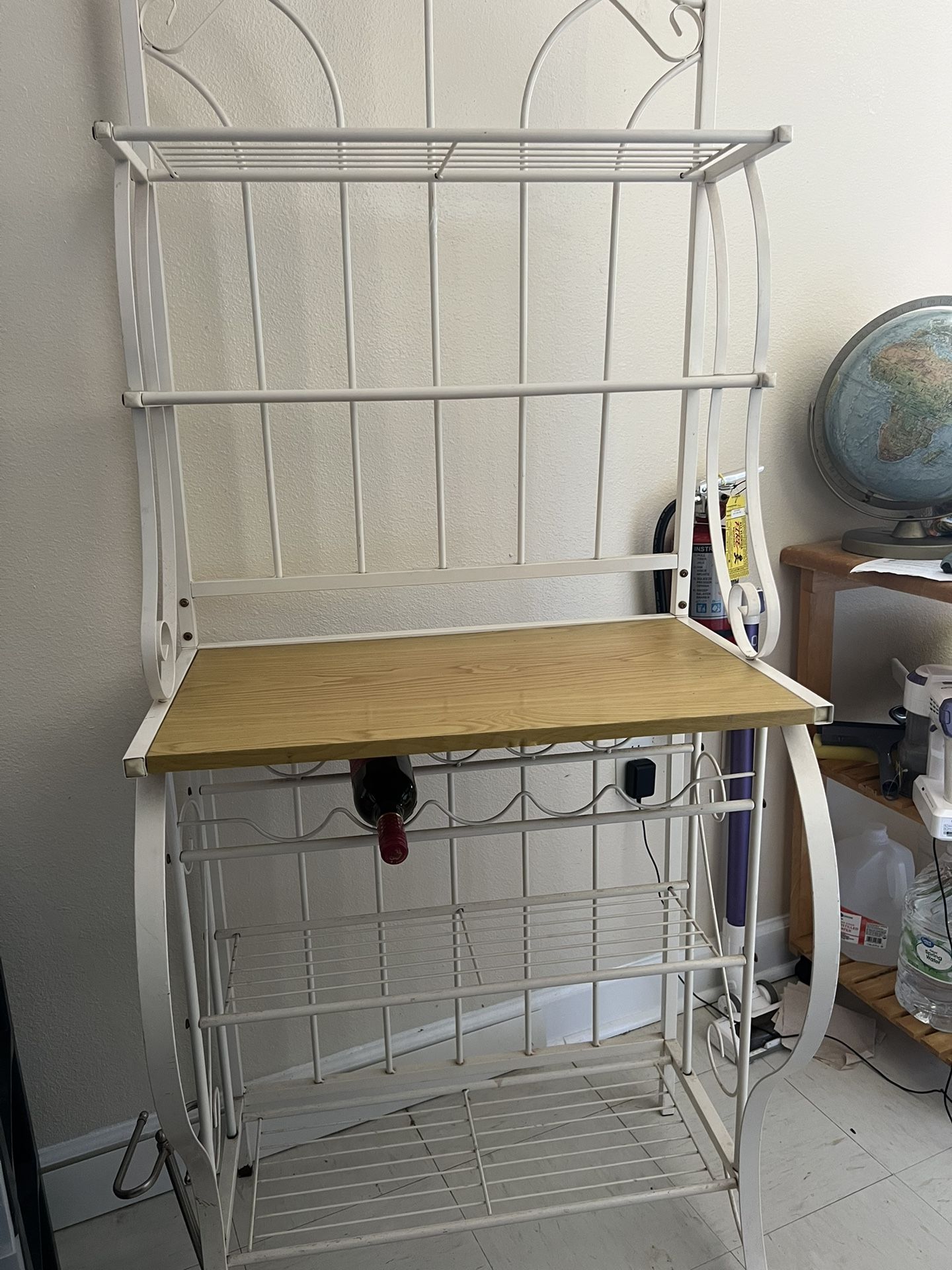 Bakers rack with wine holder