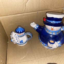 Antique teapots snowman