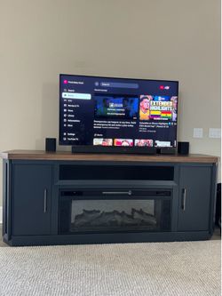 Luxury TV Unit Stand from Ashley’s Furniture with Faux fire place and Speakers x2