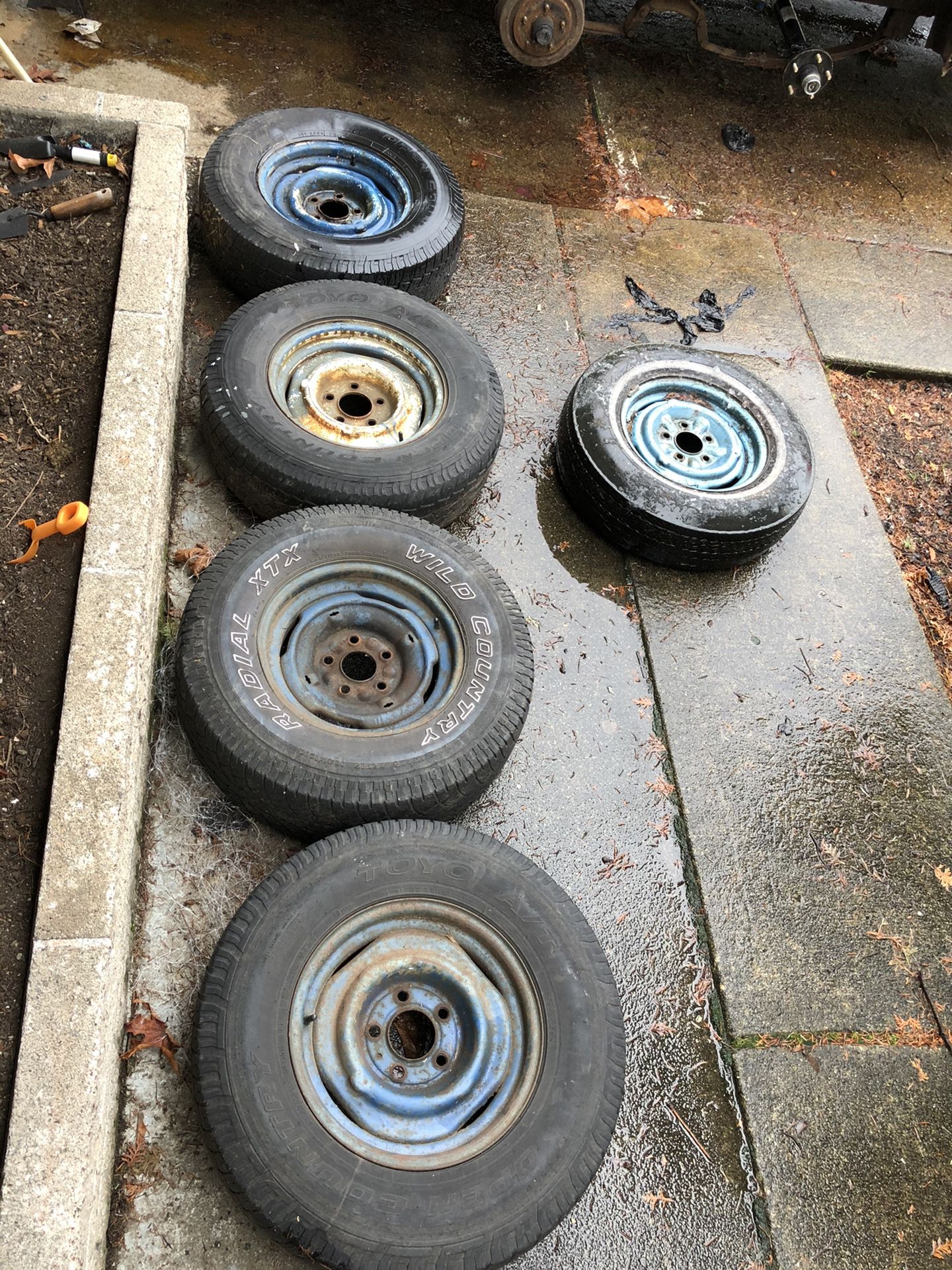 5 old Steel rims with tires